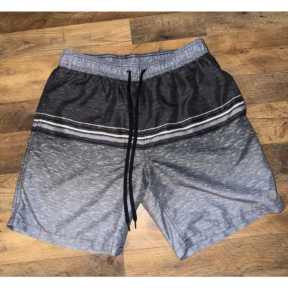 Calvin Klein men’s grey& black swim trunks